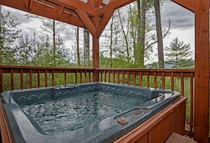 Look out at panoramic views while relaxing in the bubbling hot tub.