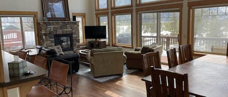 Dining room with seating for 8-12 with lake and mountain views. 