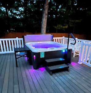 New salt water 5 person hot tub with changing neon night lighting based on mood 