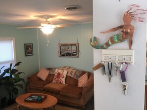 Mermaid with keys to the golf cart and house