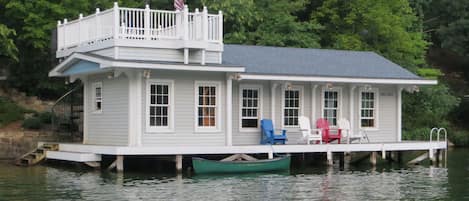 Modern Boathouse (the cottage is tucked behind the trees above the boathouse).