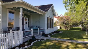 Front of House with Porch swing. 