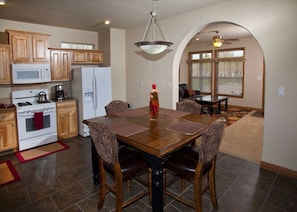 Dining area with full kitchen, laundry room and 2 refridgerators