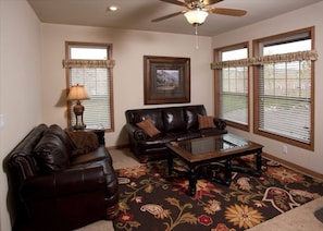 Deluxe Unit with leather furniture and 50"TV