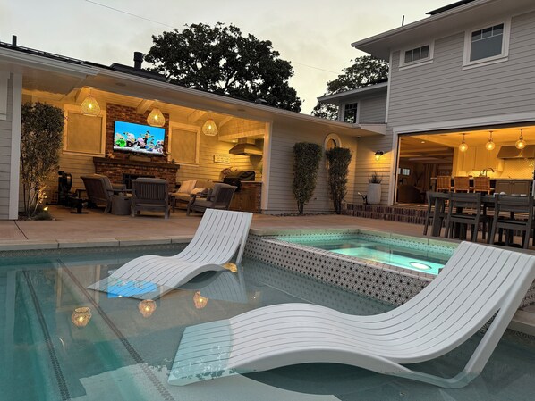 Pool, spa, outdoor room and a 4 bedroom, 4 bath coastal home to relax & unwind.