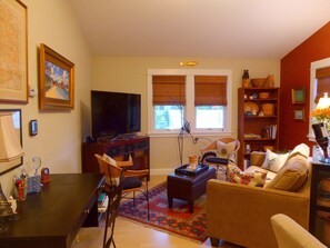 50" flat screen TV with basic DISH satellite and computer desk