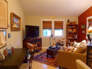 50" flat screen TV with basic DISH satellite and computer desk