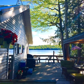 Outdoor deck and gazebo have full view of lake activity.