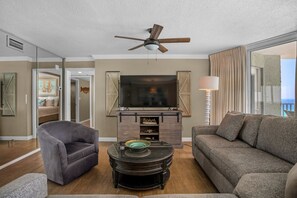 Living room area, floor to ceiling windows, custom draperies