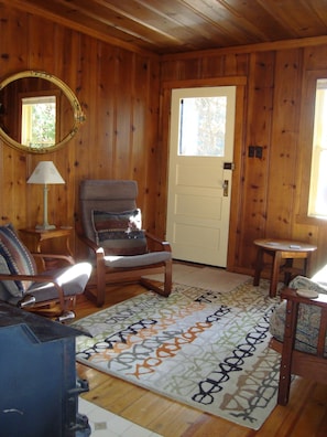 Living Room with knotty pine paneling