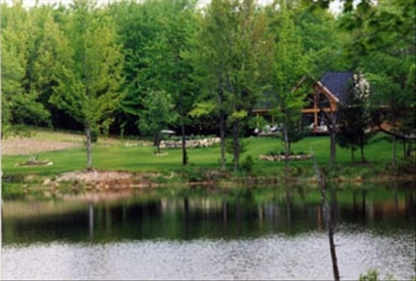 Scenic and serene, only 20 minutes from TC. Woods and water, a beautiful retreat