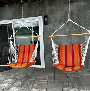 4 swing chairs on main patio