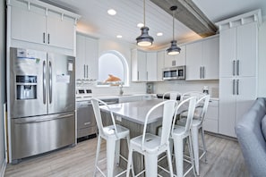 An inviting kitchen, well-stocked with everything you need for a perfect meal.