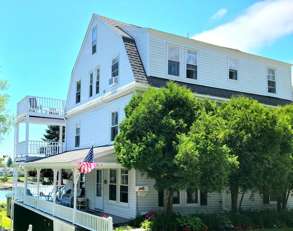 First Floor Condo, parking right outside , wrap around porch overlooking gardens