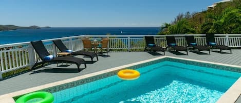 It's time to relax in the lounge chairs by the pool and enjoy the easterly view