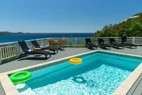 It's time to relax in the lounge chairs by the pool and enjoy the easterly view