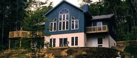 Heritage House viewed from the edge of the woods (lakeside)