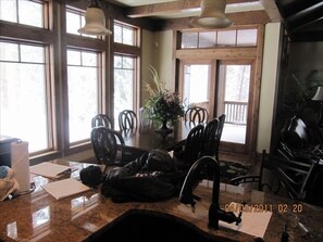 Dining room connects to kitchen & living, gas BBQ grill out glass door on deck