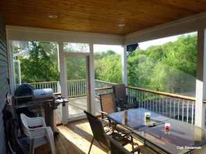 Screened in porch with walk out deck