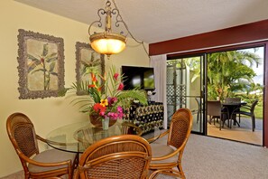 Dine indoors or out, with gorgeous ocean view from the living room and lanai.