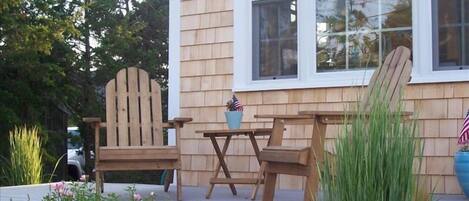 Enjoy the breeze on the front deck steps to the marsh