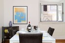 Dining room with glass table (seats six), overlooking Via della Mercede. 