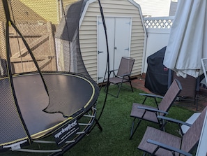 Backyard with trampoline