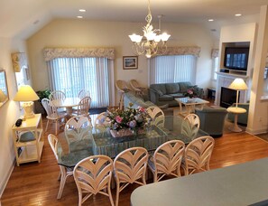 View from kitchen of main dining table (10), breakfast/game table (4) & TV area