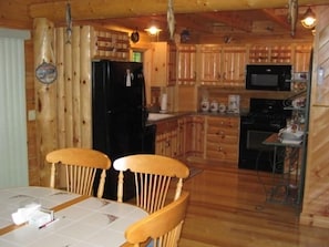 Dining /Kitchen Area All Amenities, Log Type Draws and Cabinets/W/Deer Decor