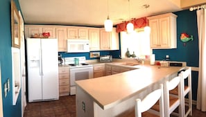 Kitchen with new appliances and corian counter tops. Ocean views from the sink!!