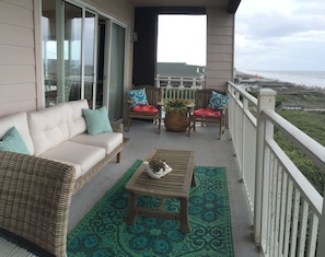 You can watch your family on the beach from the ocean front patio