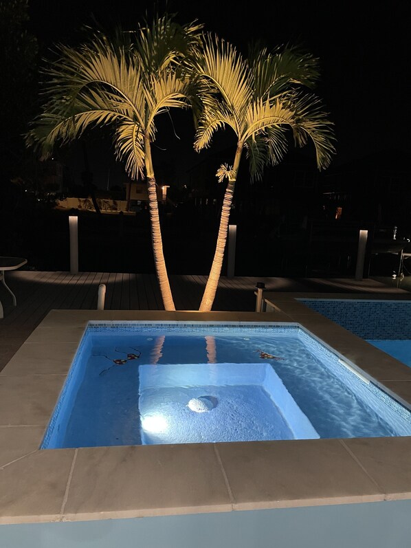 Relaxing photo of our jacuzzi at night.