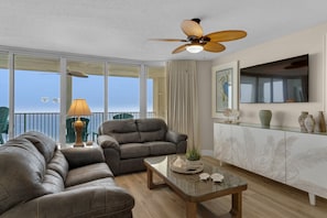 Wall of windows captures stunning Gulf views. Balcony access at living room