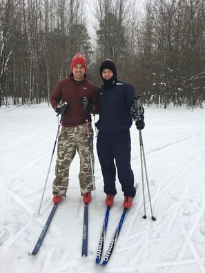 My son and I skiing on a local ski trail. GR area has 25-30 groomed ski trails!
