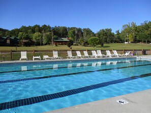 Come enjoy the pool right across yard from the cabin!