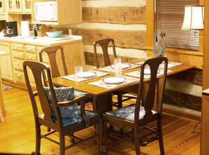 Dining inside seating up to 14. This table rolls out to accommodate 6.