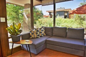 Sitting area to watch TV or relax. The sofa converts to a full size bed