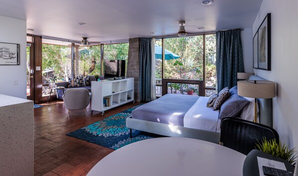 This bright and spacious studio features floor to ceiling windows.