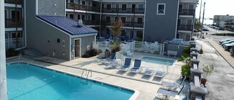 Adult pool area with plenty of seating.