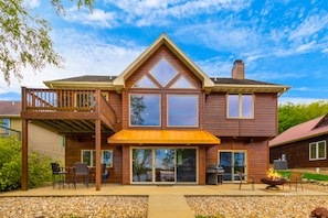 Large Sliding Glass Doors allow for Open Air Lake Lifestyle