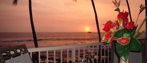 Watch the cruise ship sail into the sunset while enjoying dinner on the lanai.