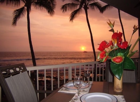 Watch the cruise ship sail into the sunset while enjoying dinner on the lanai.