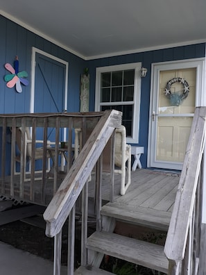 Front Door entrance into Living Room from carport.