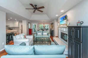 Beautifully staged living room designed for gathering.