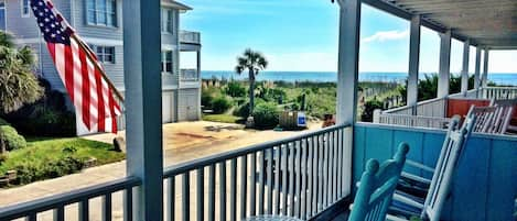 Ocean view from porch rocking chairs.