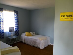Bedroom with a twin bed and twin bed bunk

