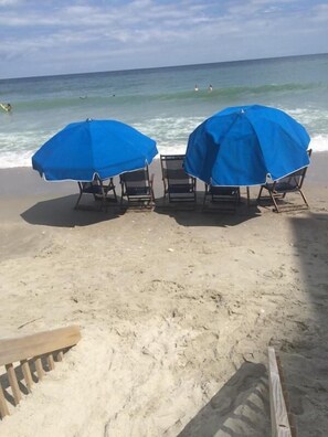 Balcony View 2 Umbrellas and 5 Chairs set up daily Memorial - Labor day 
