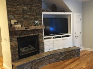 60 inch Smart TV.  Gas fireplace.