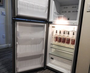 Apartment sized fridge with room for all of your favorite snacks and beveridges