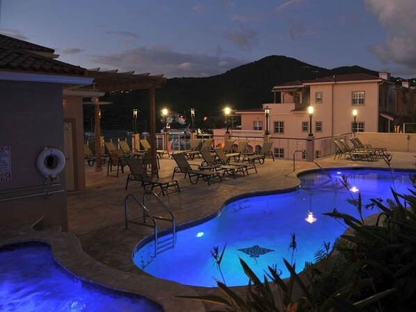 Pool Deck and Jacuzzi at night